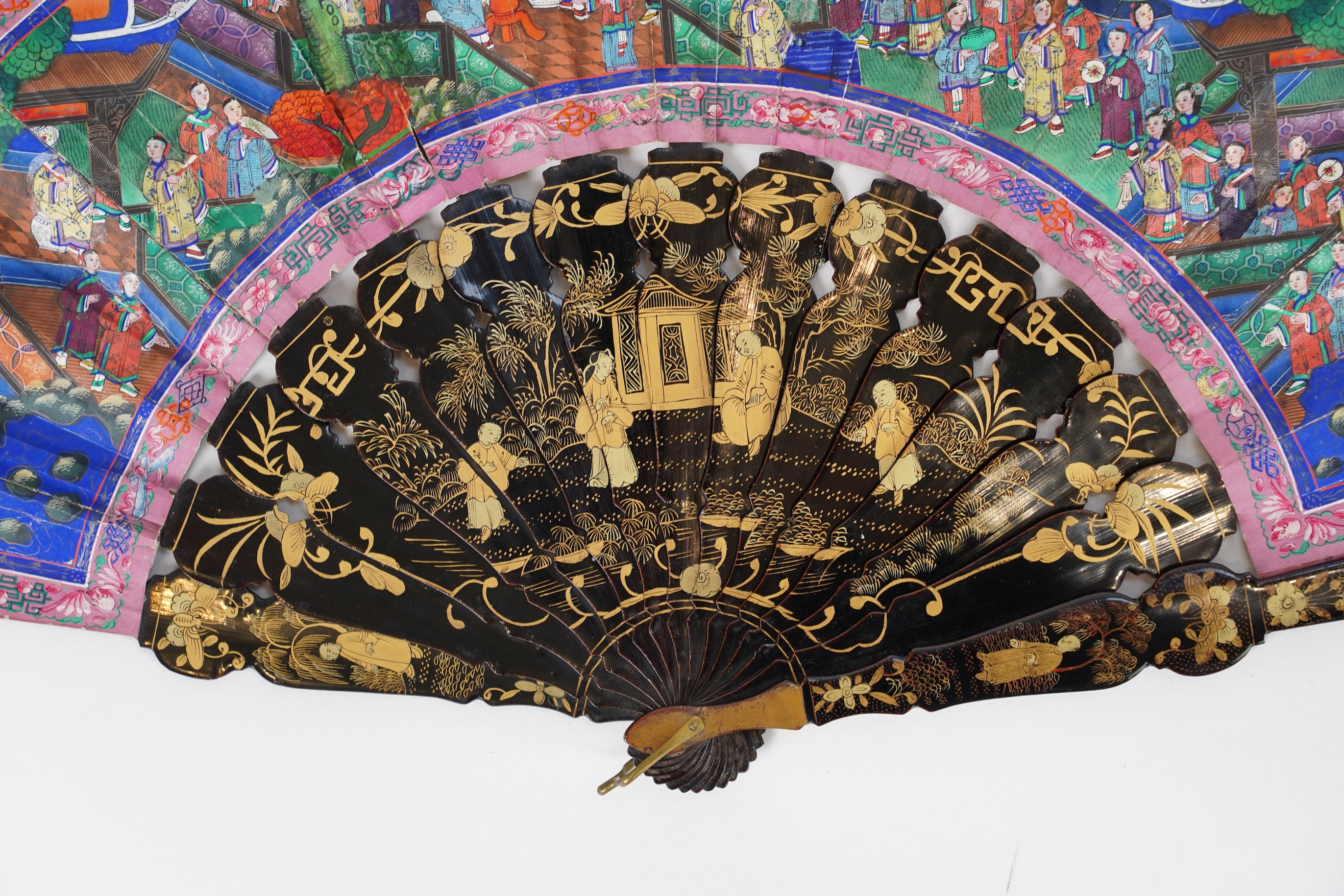 Three Chinese gilt-decorated black lacquer and painted leaf fans, 19th century
